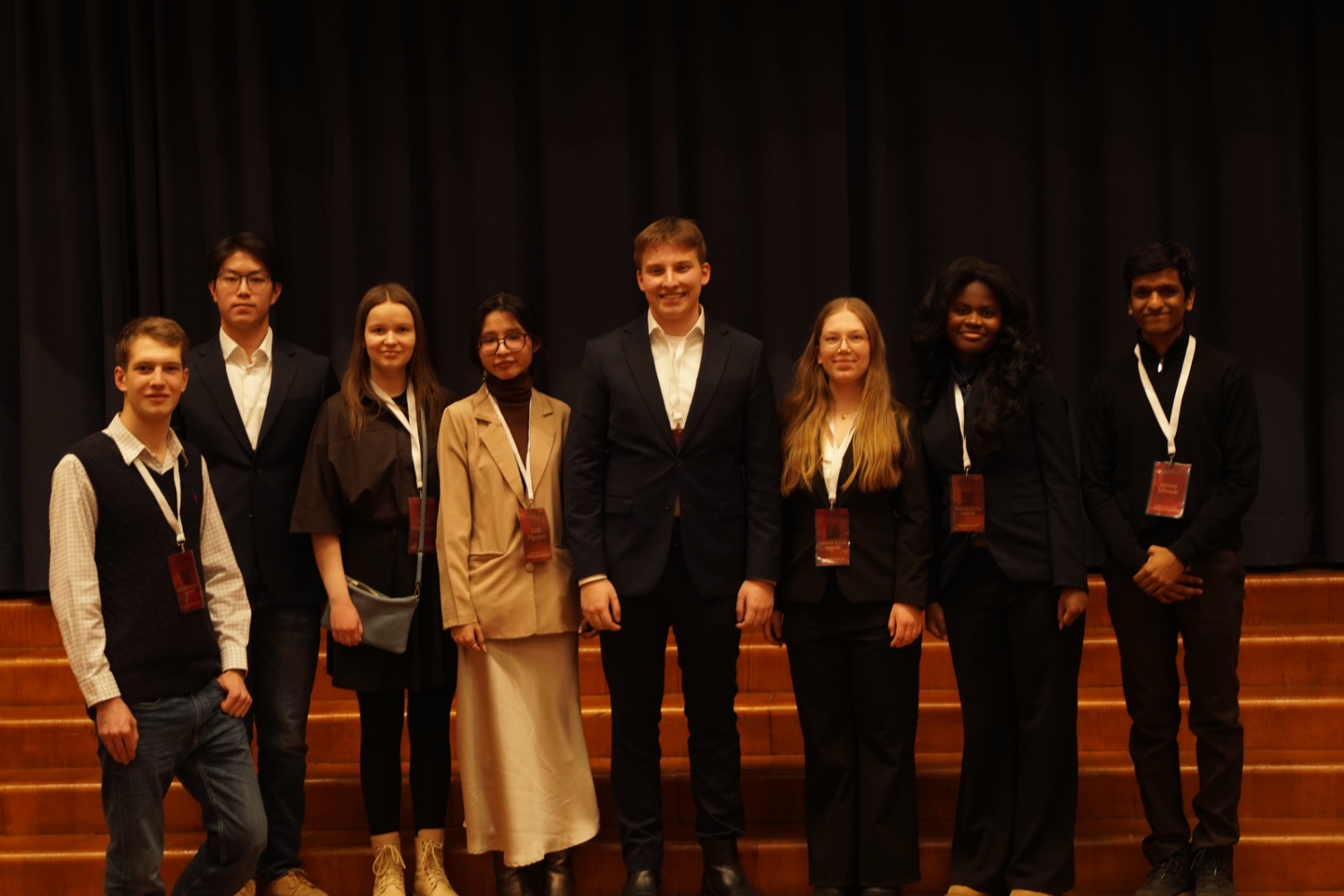 HYMT 2026 organising team on stage after the final