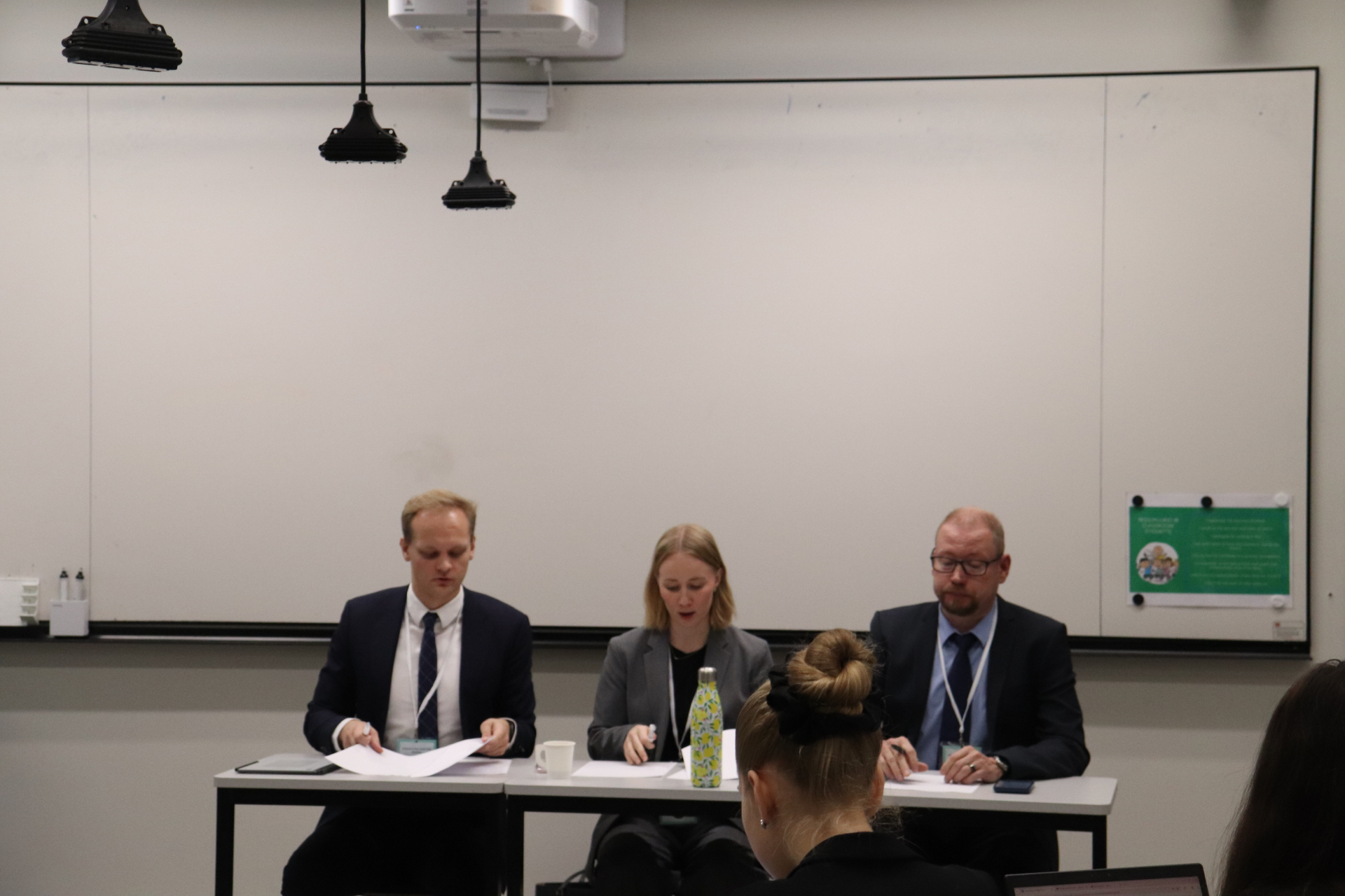 Judging panel of legal professionals during a HYMT 2024 trial round